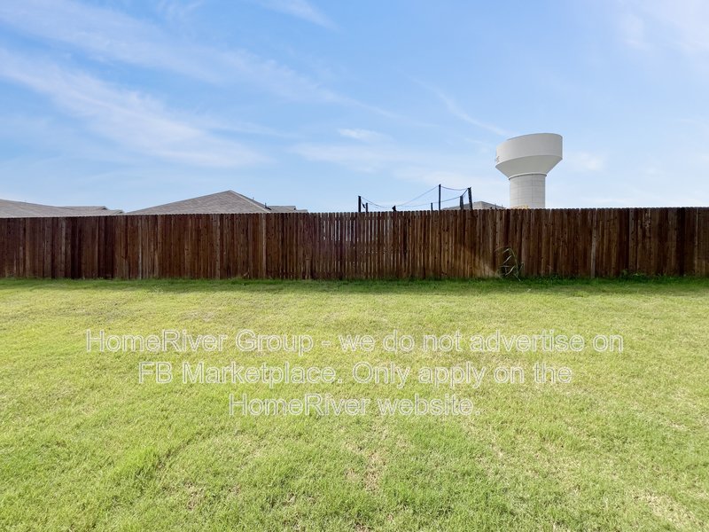 4 BR Home | Quartz Counters | Covered Patio | Refrigerator property image