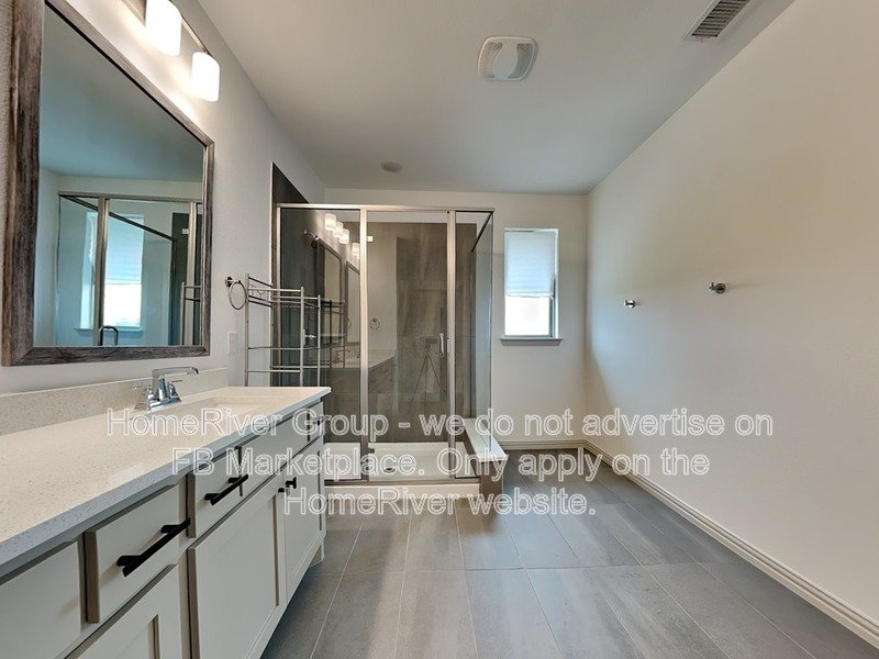 SS Appliances | Chef Kitchen | Solid Surface Flooring | Frisco ISD property image