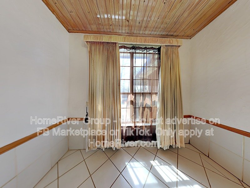 Ranch Style | High Ceilings | See through Fireplace property image