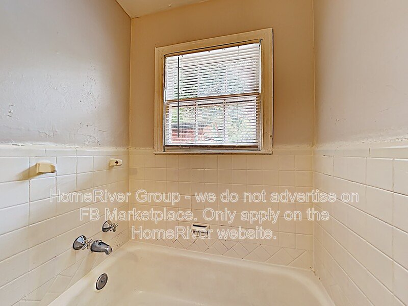 Spacious 2BR | Detached Garage | Paved Back Patio | Refrigerator property image