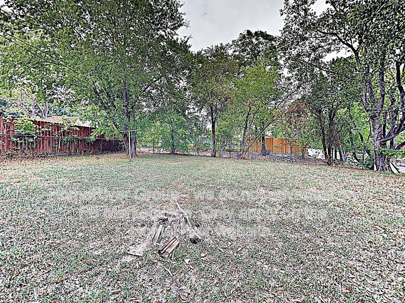 Spacious 2BR | Detached Garage | Paved Back Patio | Refrigerator property image