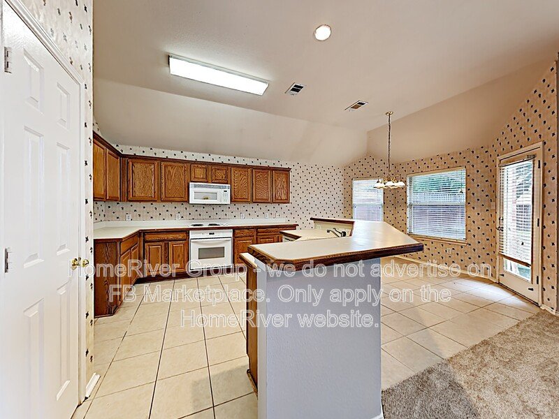 3 BR, 2 BA Home | Community Pool | Fireplace | Classic Kitchen property image