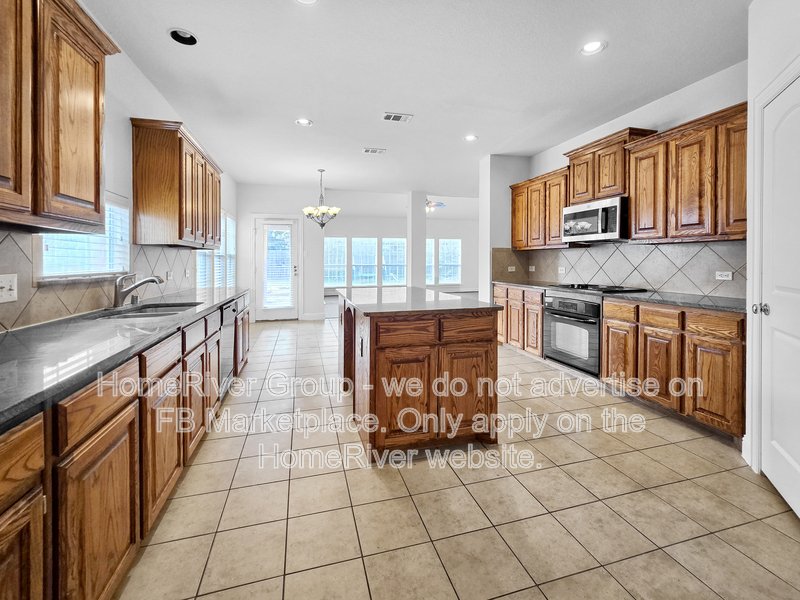 Spacious 4BR with Covered Patio | Fireplace | Refrigerator | Winding S property image