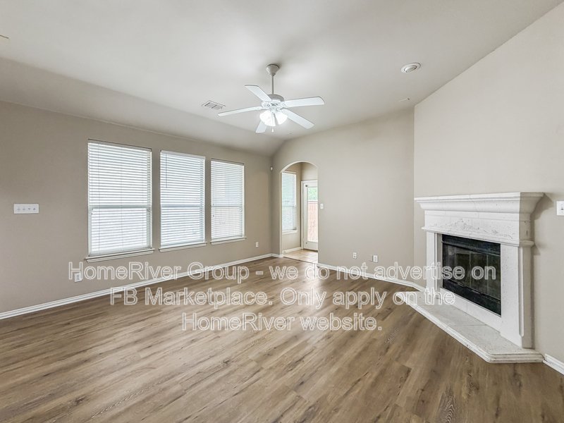 4 BR Home | Lantana Golf Course | Fireplace property image