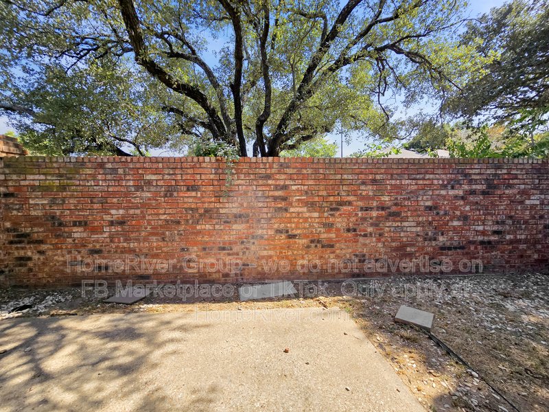 Fireplace | Fenced Back yard | Built-in Wet Bar | Attached Two-car Gar property image