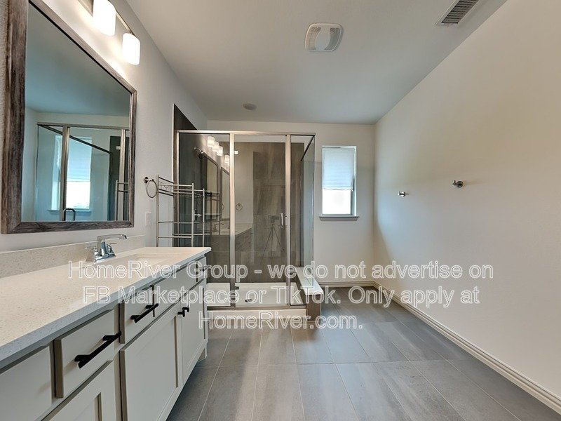 SS Appliances | Chef Kitchen | Solid Surface Flooring | Frisco ISD property image
