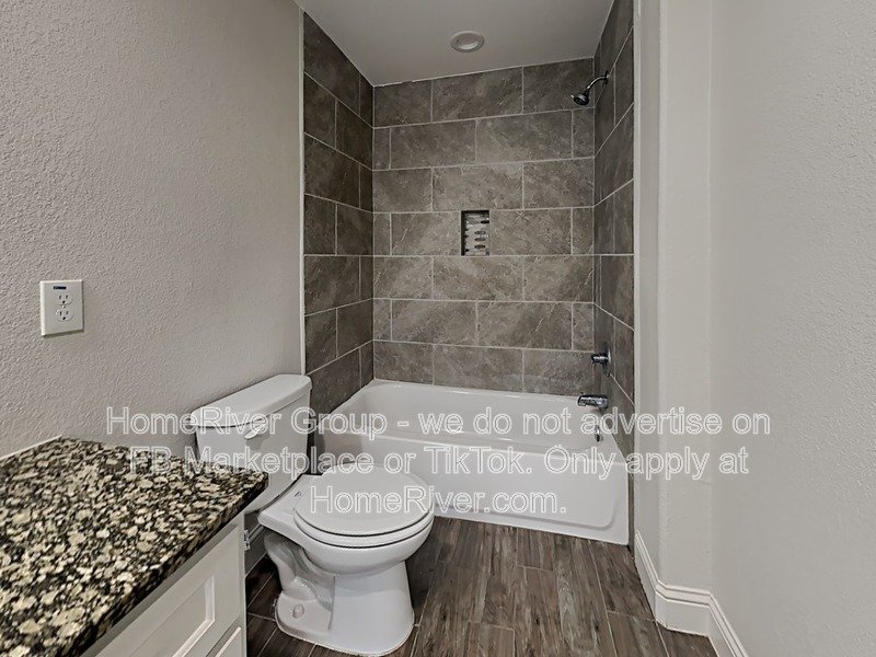 Charming Duplex - Refrigerator - Open Floorplan - Laminate flooring property image