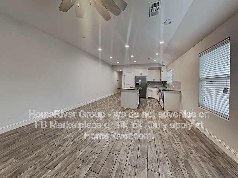 Charming Duplex - Refrigerator - Open Floorplan - Laminate flooring property image