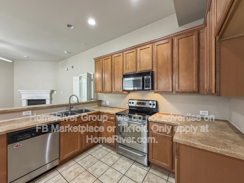 4 BR Home | Lantana Golf Course | Fireplace property image