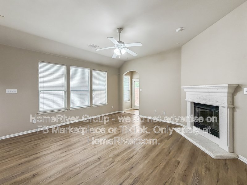 4 BR Home | Lantana Golf Course | Fireplace property image