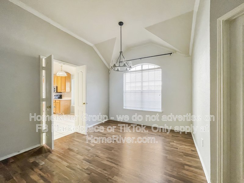 Spacious Livingroom with gas fireplace, large fenced backyard! property image