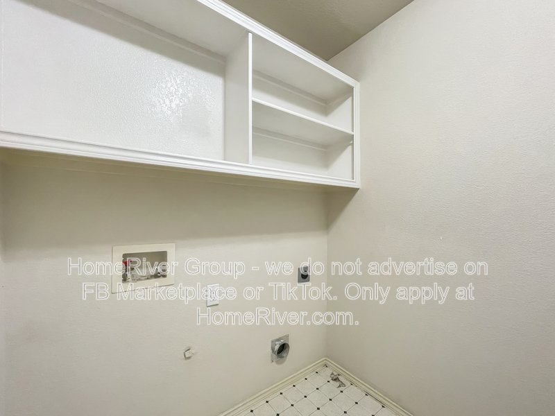 Spacious Livingroom with gas fireplace, large fenced backyard! property image