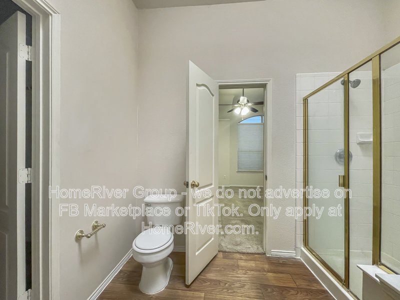Spacious Livingroom with gas fireplace, large fenced backyard! property image