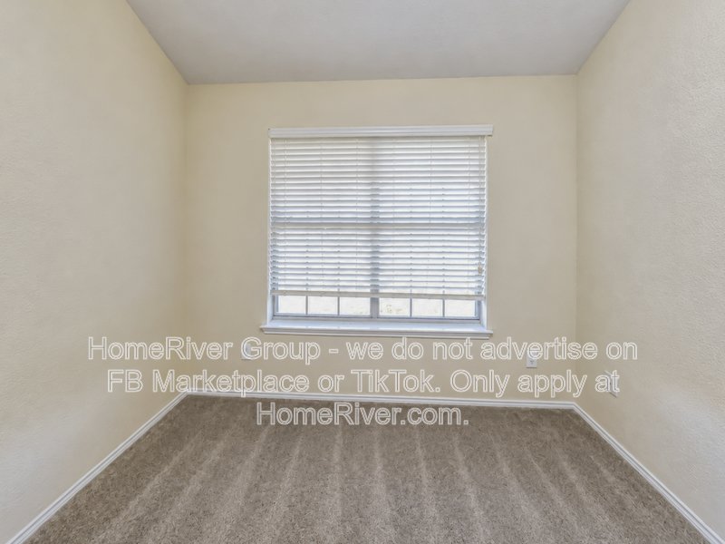Spacious Livingroom with gas fireplace, large fenced backyard! property image