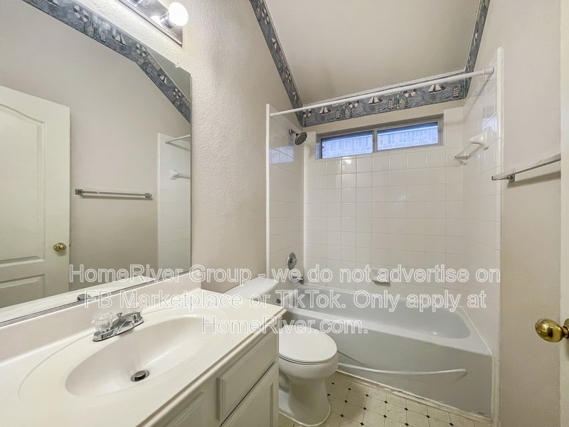 Spacious Livingroom with gas fireplace, large fenced backyard! property image